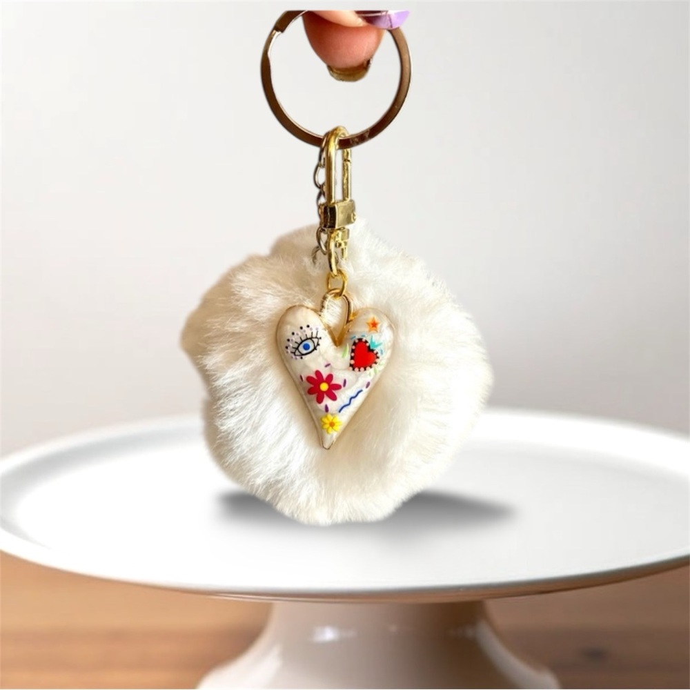 5/$25 White Fuzzy ball with heart charm bag charm Or key chain brand new